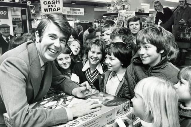 Children's TV star Leslie Crowther draws a crowd to Redgates in November 1975