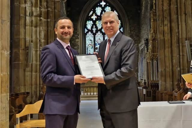 Firas Jabar receiving the Duke of York Community Initiative Award on behalf of City of Sanctuary Sheffield