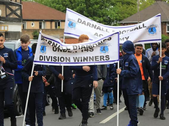 Darnall Football Academy held a parade down Staniforth Road. Picture: Chris Etchells.