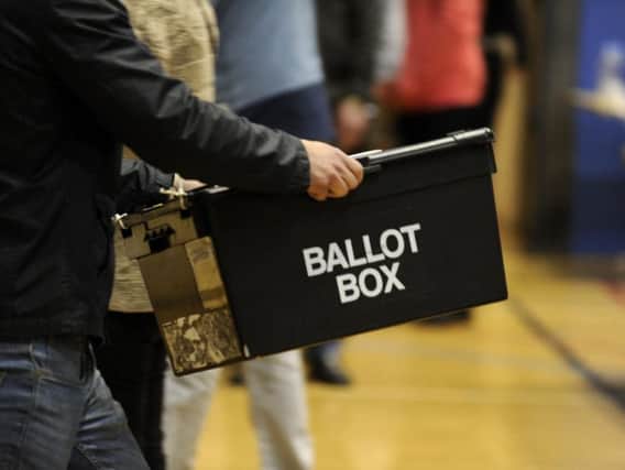 A ballot box being taken into an election count