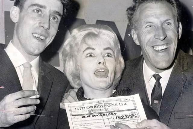 Bruce Forsyth presenting Keith and Viv Nicholson with the winning pools cheque