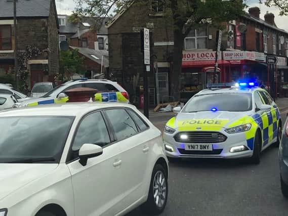 Police in attendance on Abbeydale Road. Picture: Jonathan Young.