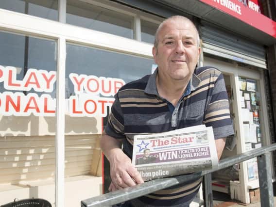 Geoff Wright outside the newsagents he ran for 30 years in Charnock