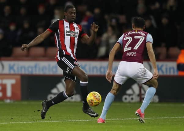 Clayton Donaldson of Sheffield Utd runs at Ahmed Elmohamady of Aston Villa during the Championship match at Bramall Lane Stadium, Sheffield. Picture date 30th January, 2018. Picture credit should read: Simon Bellis/Sportimage