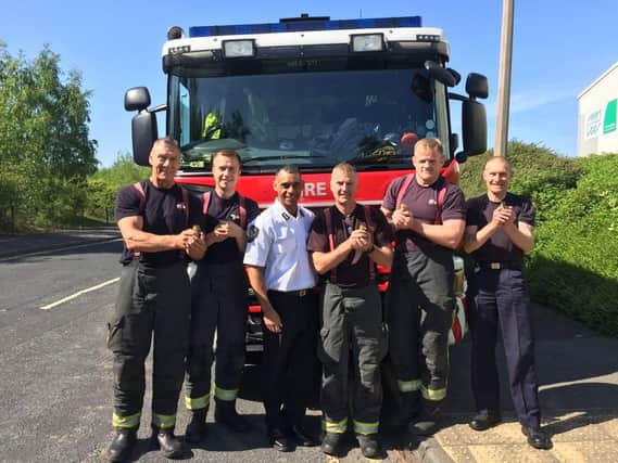 Firefighters from Tankersley with the ducklings.