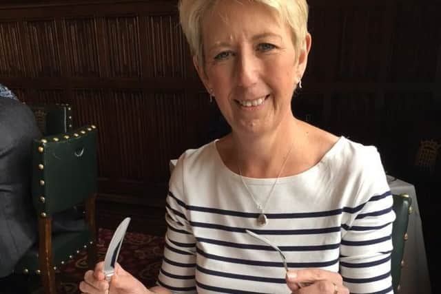 Angela Smith MP with the new Sheffield-made stainless steel cutlery introduced in the House of Commons
