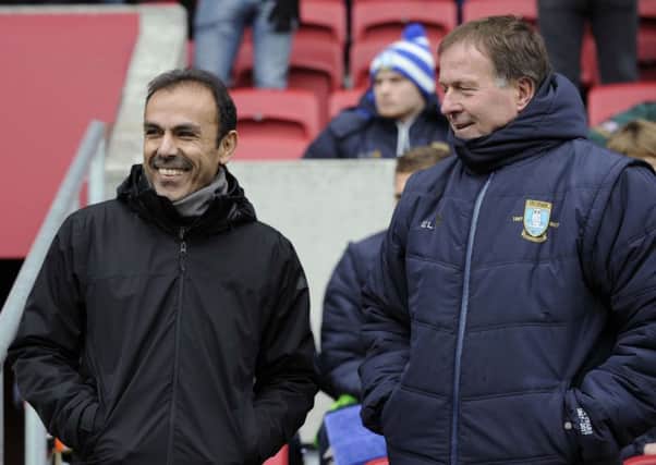 Jos Luhukay, left, and assistant manager Remy Reynierse