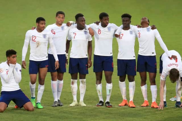 England players appear dejected after losing the penalty shoot-out to Holland during the UEFA European U17 Championship semi final match at the Proact Stadium, Chesterfield. Mike Egerton/PA Wire.