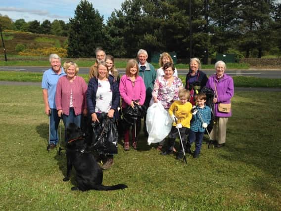 Geraldine Houlton and fellow litter pickers help clean the area around Lodge Moor.