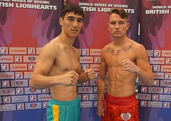 Dalton Smith GB and his victorious Kazakh opponent, left