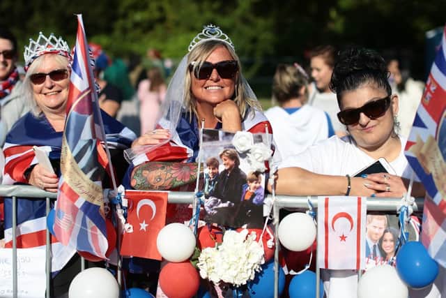 Spectators arrive on the Long Walk ahead of the wedding of Prince Harry and Meghan Markle. Aaron Chown/PA Wire