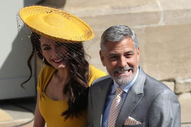 Amal Clooney and George Clooney arrive at St George's Chapel in Windsor Castle for the wedding of Prince Harry and Meghan Markle. Picture:  Andrew Milligan/PA Wire