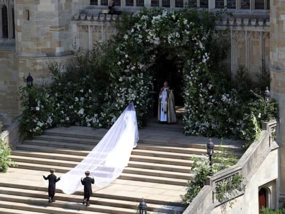 Meghan Markle arrives at St George's Chapel at Windsor Castle for her wedding to Prince Harry. Picture: Andrew Matthews/PA Wire