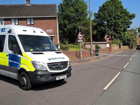Police guard the scene in Barnsley after the discovery of a woman's body. Picture: @SYP_Specials