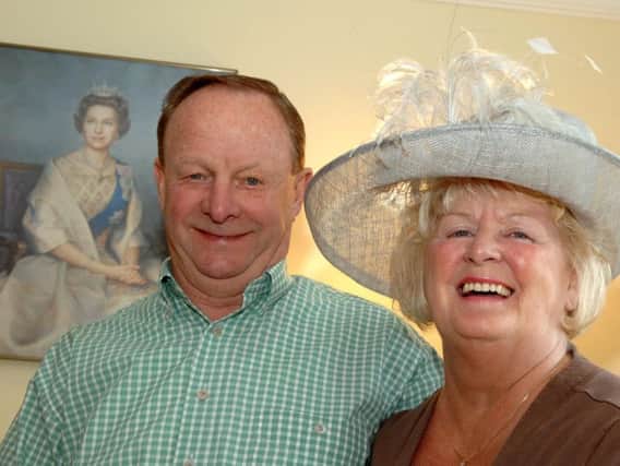 Ray and Barbara preparing to meet the Queen in 2008.