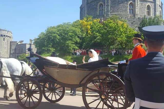Narmila and Jarnel Singh got a good view of the newlyweds leaving by carriage