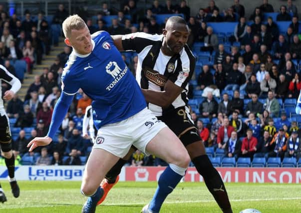Picture Andrew Roe/AHPIX LTD, Football, EFL Sky Bet League Two, Chesterfield v Notts County, Proact Stadium, 25/03/18, K.O 1pm

Chesterfield's Alex Whitmore battles with County's Shola Ameobi

Andrew Roe>>>>>>>07826527594