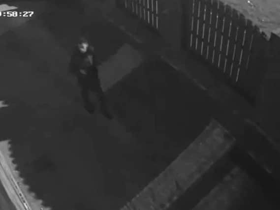 CCTV of man wanted in connection with attempted burglary.