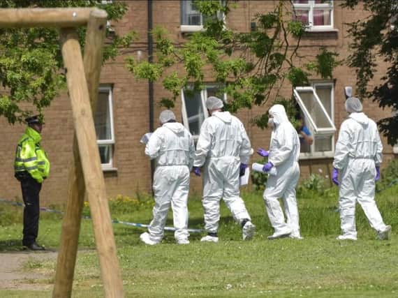 Forensic experts in Tannery Close, Woodhouse