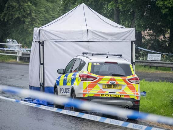 Police at the scene in Lowedges, where a 15-year-old boy was stabbed to death