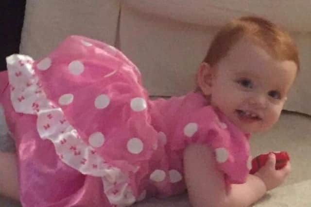 Erin Tomkins, aged 22-months, died of head injuries on Tuesday, May 22