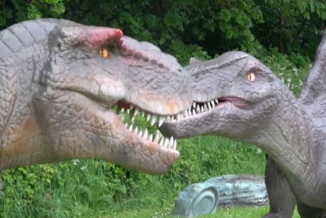 Battling dinosaurs come to life with robotic wizardry