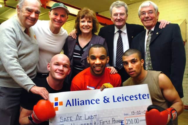 Flashback: Representatives from Doncaster Lions presented a cheque for £250 to South Yorks Charity 'Safe at Last' at Brendan Ingle's Newman Road Gym with the help of three of his boxers. BR LtoR.Denis Claybourn(Lions),Brendan Ingle,Christine Ayres(Safe at Last Charity),John Coxon(Lions),Gerad Johnstone(Lions).FR LtoR. Boxers John Keeton,Junior Witter,Esham Pickering