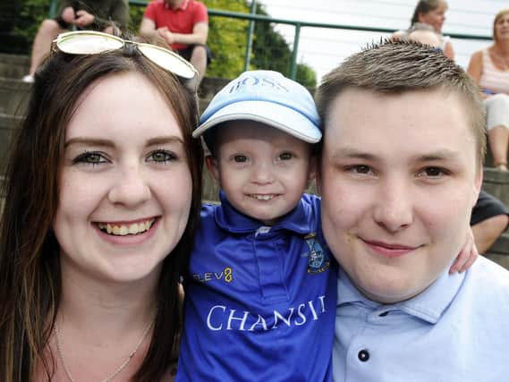 Lucas Brand with his mum Danielle Eyre and dad Luke Brand