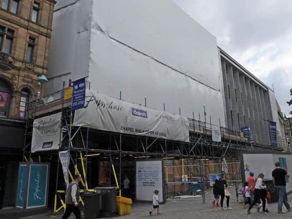 Scaffolding and white tarpaulin cover Fargate Court and the entrance to Chapel Walk. Picture: Andrew Roe