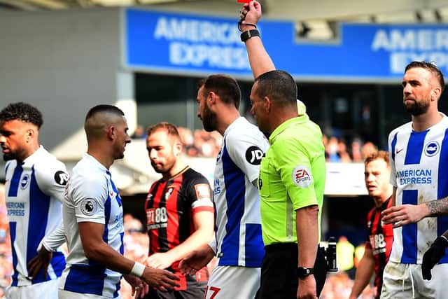 Red cards: 7. Yellow cards: 117. (Photo credit: GLYN KIRK/AFP/Getty Images)