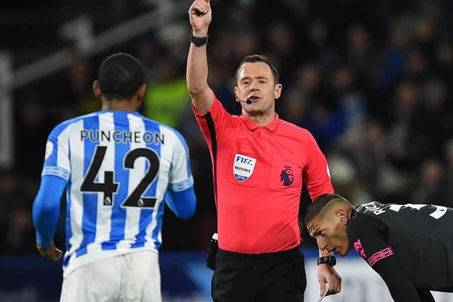 Red cards: 7 . Yellow cards: 117. (Photo credit: OLI SCARFF/AFP/Getty Images)
